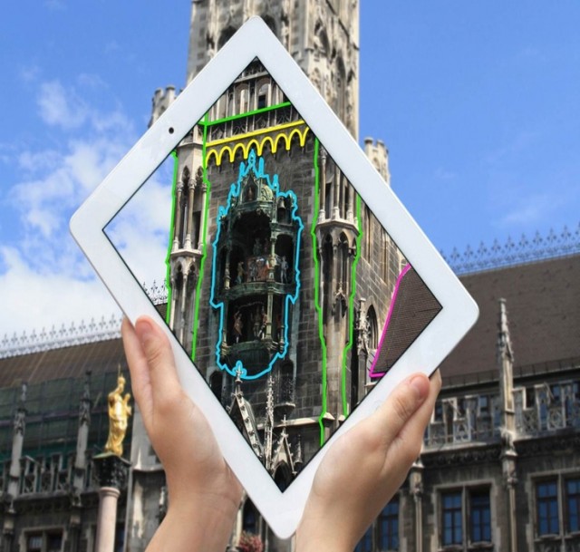 Projection mapping, without the projector. Metaio shows off their tech at Munich's Marienplatz. Photo courtesy Metaio.