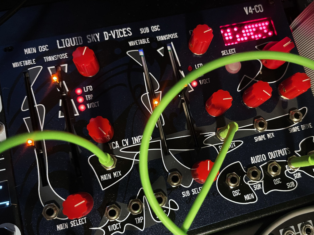 Close up of the V4CO dual wavetable oscillator, showing LED display with a pattern for the wavetable, and wavetable and transpose controls and audio outputs and transpose/pitch inputs.