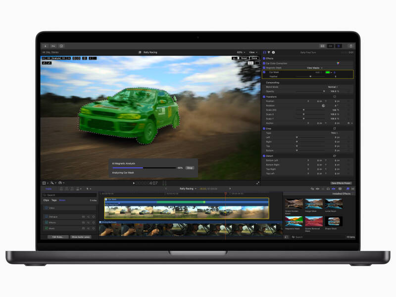 Magnetic Masking demonstration in Final Cut Pro 11 running on a MacBook, showing a car highlighted in green in the edit window plus a status dialog, timeline view open.