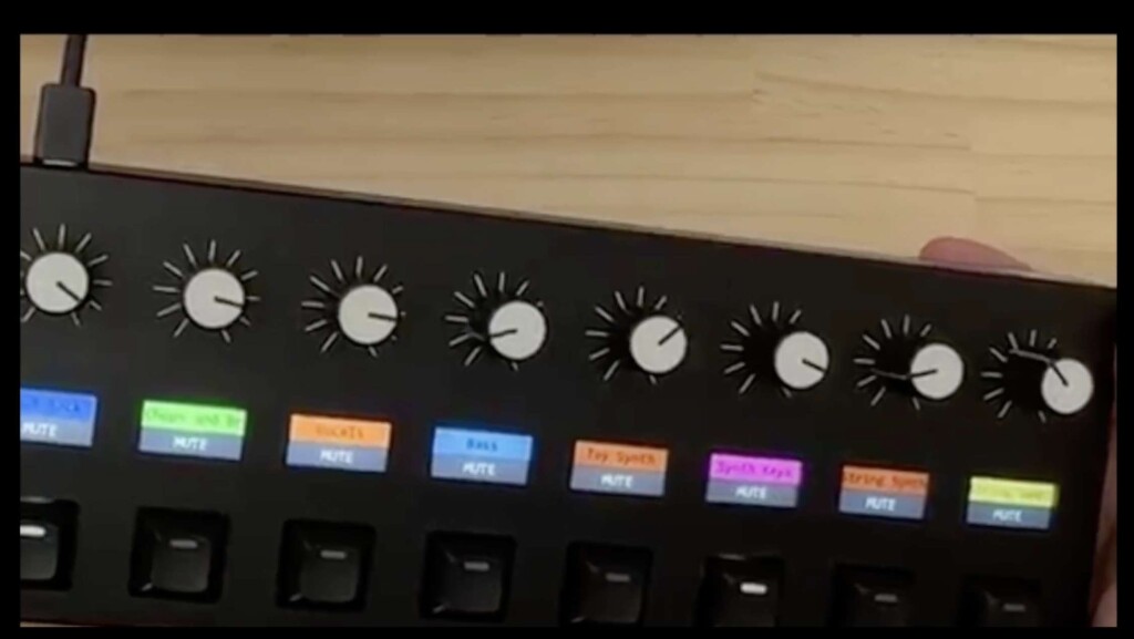 Frame from leaked video showing knobs, indicators, OLED (?) displays with color and text feedback showing parameters, state