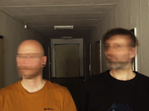two men with blurred faces