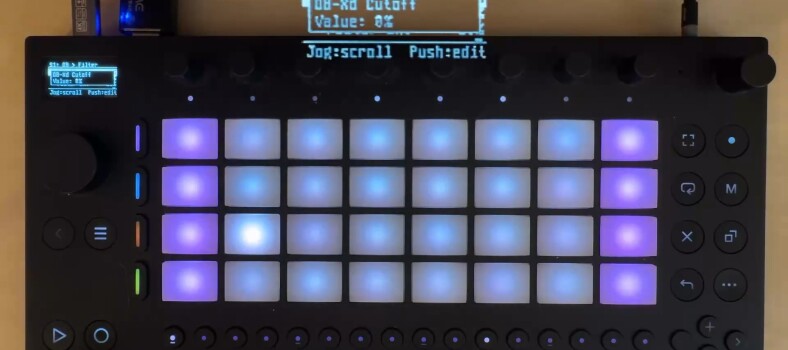 Ableton Move hardware, compact grid-based standalone groovebox, running Move Everything, showing overlay of (streamed) display wit OB-Xd open source Oberheim model and cutoff parameter