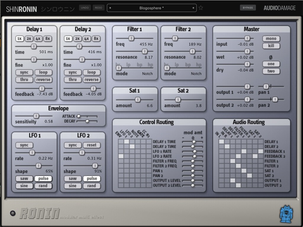 Ronin UI from 2003, reborn as ShinRonin -- complete with blue robot Audio Damage logo, ribbed gray backdrop, and dual delays, LFOs, filters, and saturation, plus envelope follower, master parameters, and crucially, big routing matrices for control and audio.
